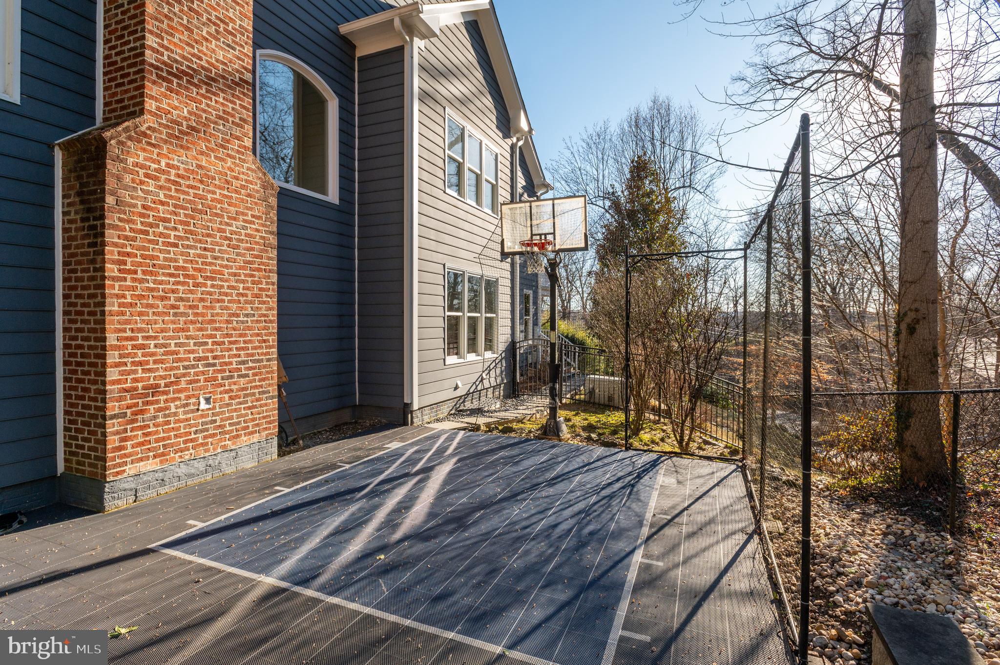 5400 Mohican Road Bethesda, MD 20816 - Photo 43 of 47 a view of backyard with a large tree