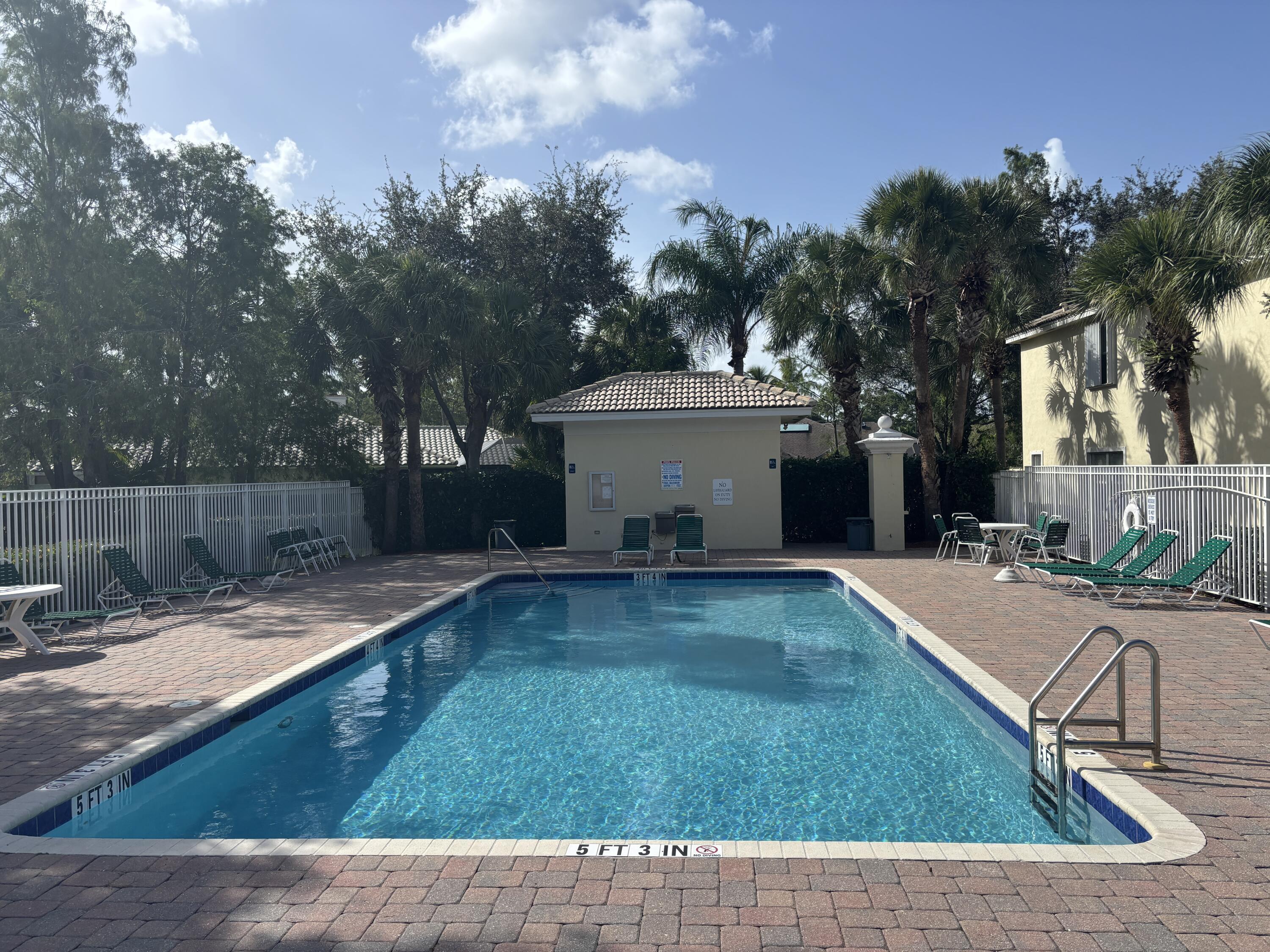 13472 Old Englishtown Road Wellington, FL 33414 - Photo 3 of 18 a view of a backyard with swimming pool
