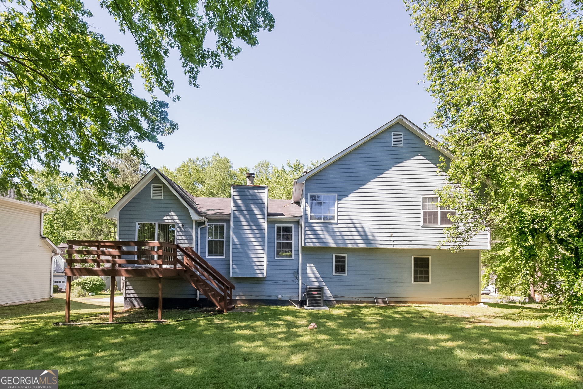 2353 Loren Falls Lane Southwest Marietta, GA 30008 - Photo 15 of 17 a view of a house with a yard and sitting area