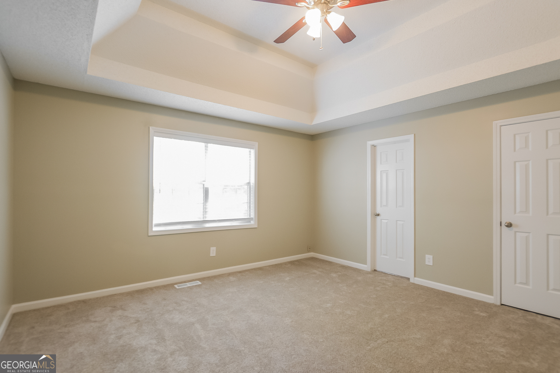 2353 Loren Falls Lane Southwest Marietta, GA 30008 - Photo 9 of 17 a view of an empty room with a window