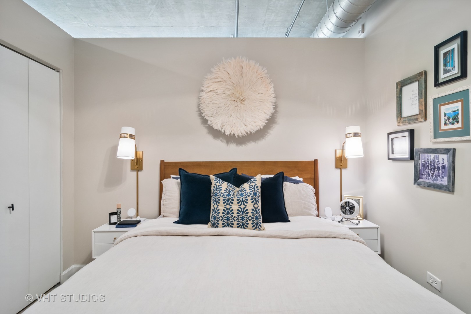 Undisclosed Address Chicago, IL 60607 - Photo 17 of 22 a bedroom with bed and wooden floor