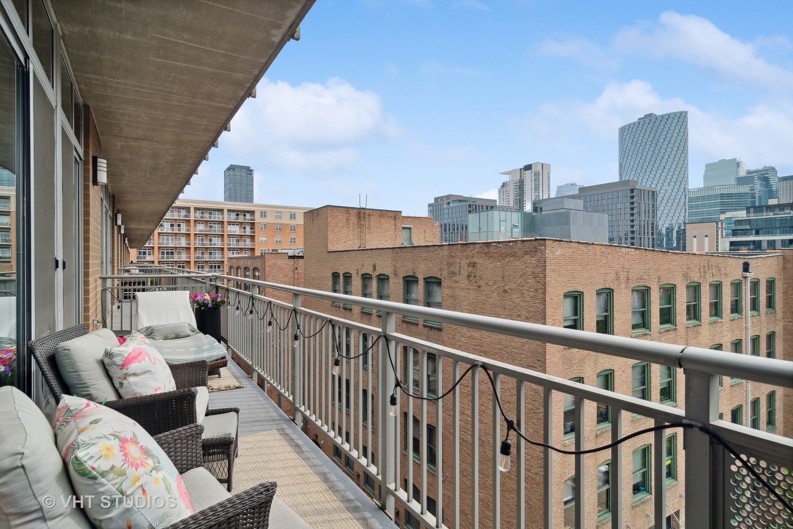Undisclosed Address Chicago, IL 60607 - Photo 20 of 22 a view of a balcony with furniture