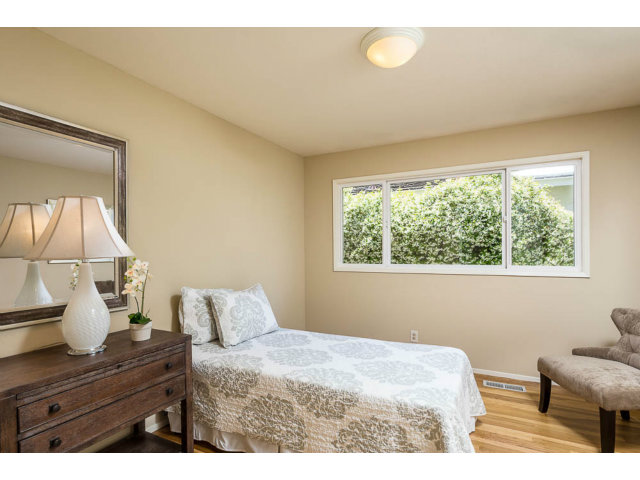2202 Greer Road Palo Alto, CA 94303 - Photo 12 of 18 a bedroom with a bed and a window