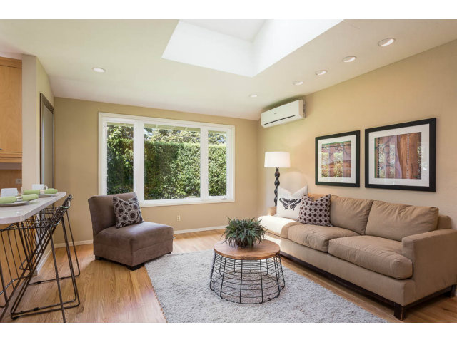 2202 Greer Road Palo Alto, CA 94303 - Photo 4 of 18 a living room with furniture and a large window