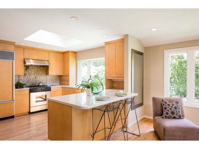 2202 Greer Road Palo Alto, CA 94303 - Photo 5 of 18 a kitchen with stainless steel appliances granite countertop a stove a sink and a refrigerator