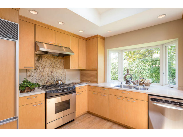 2202 Greer Road Palo Alto, CA 94303 - Photo 6 of 18 a kitchen with a stove a sink and a window