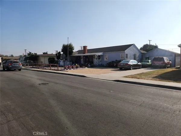 a view of a street with houses