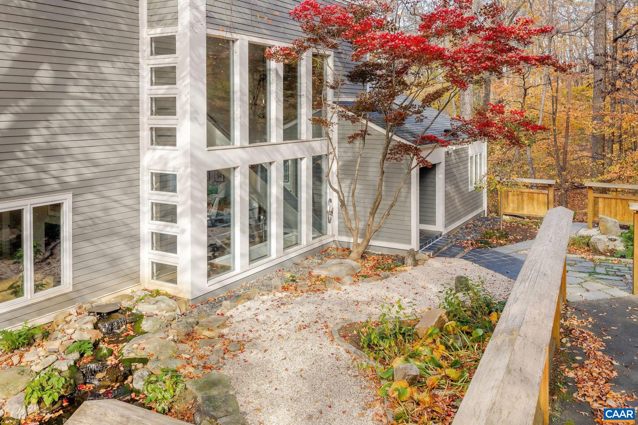 407 Broad Axe Road Charlottesville, VA 22903 - Photo 11 of 57 a front view of a house with a tree