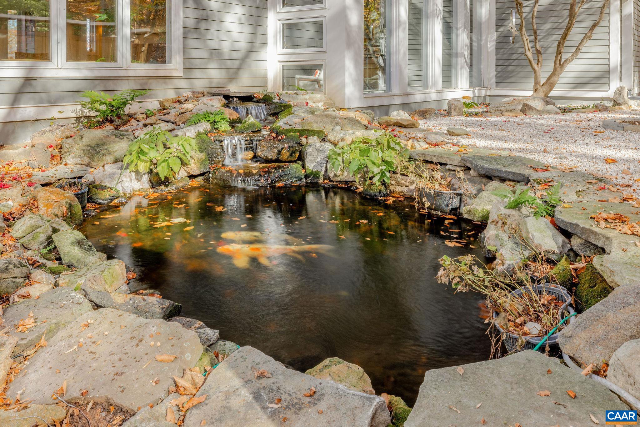 407 Broad Axe Road Charlottesville, VA 22903 - Photo 14 of 57 a view of swimming pool with outdoor seating