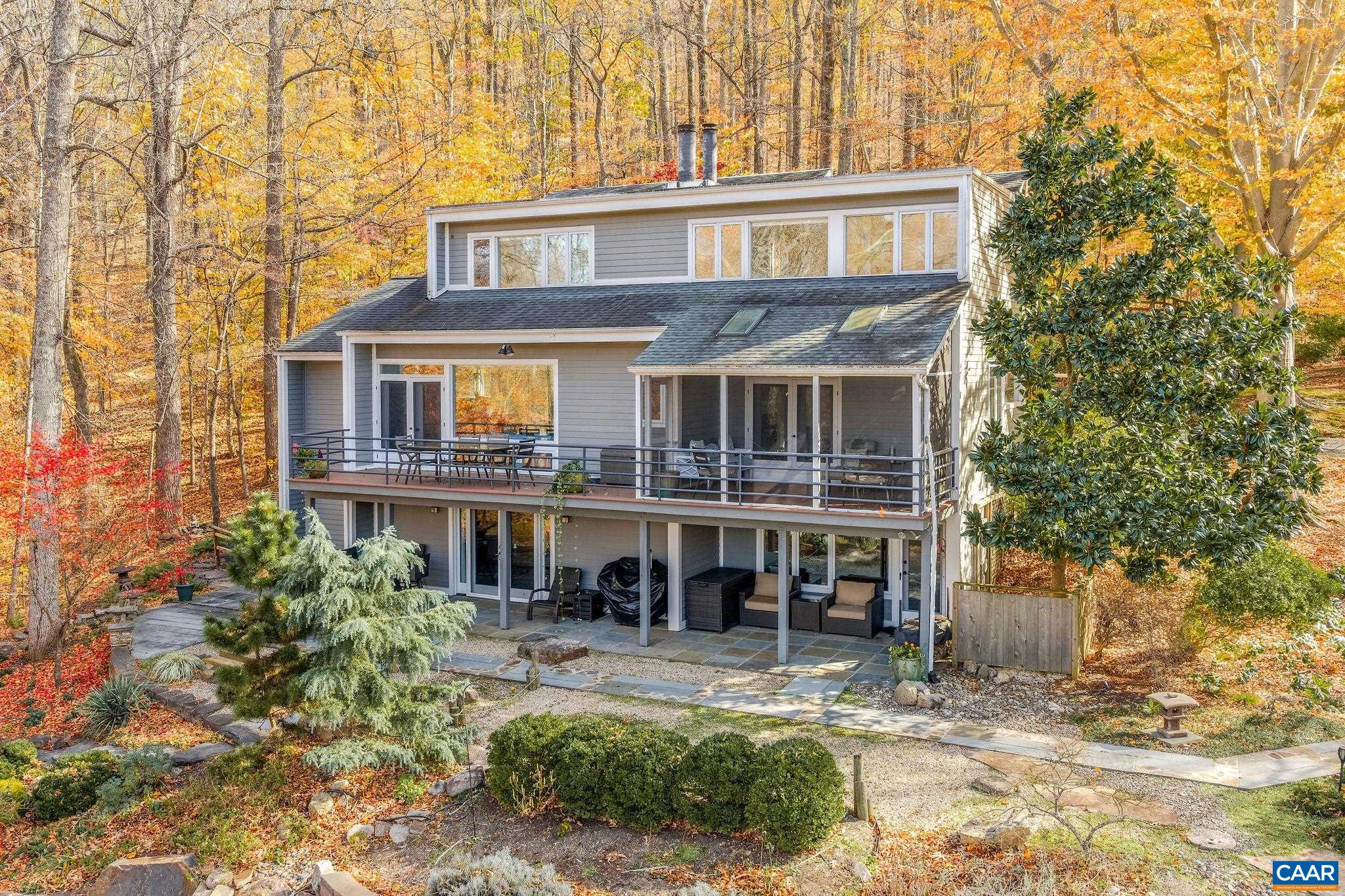 407 Broad Axe Road Charlottesville, VA 22903 - Photo 15 of 57 front view of a house with a yard