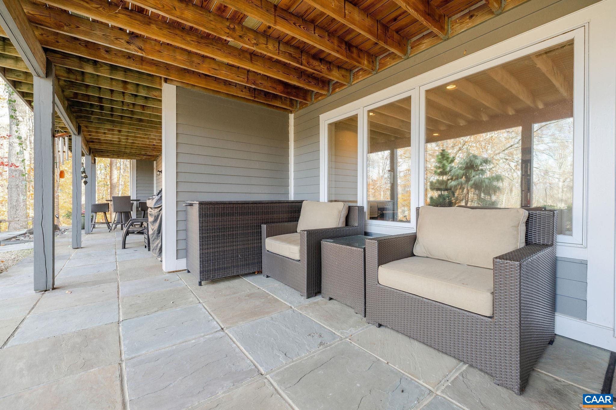 407 Broad Axe Road Charlottesville, VA 22903 - Photo 16 of 57 a living room with furniture a large window with outer view