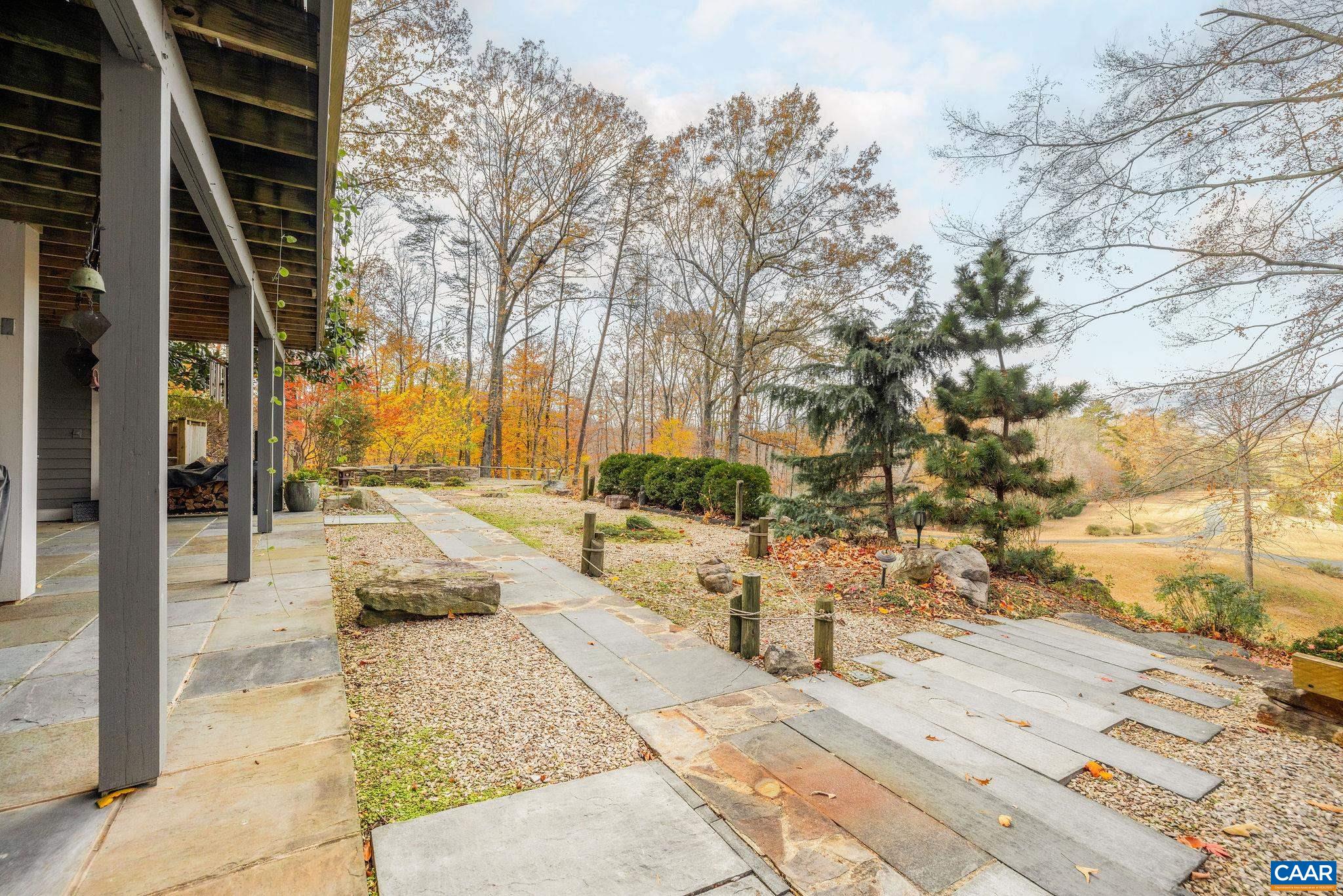 407 Broad Axe Road Charlottesville, VA 22903 - Photo 17 of 57 a view of a pathway with a yard