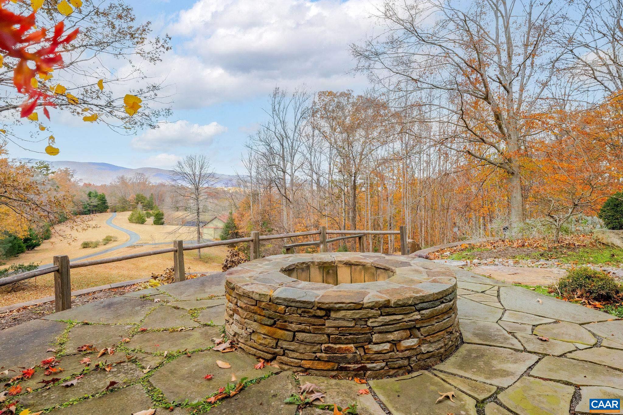 407 Broad Axe Road Charlottesville, VA 22903 - Photo 18 of 57 a view of swimming pool with sitting area