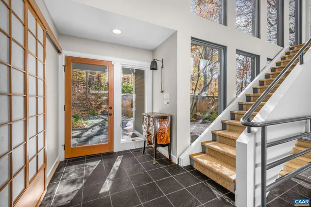 a kitchen with stainless steel appliances granite countertop a sink and cabinets