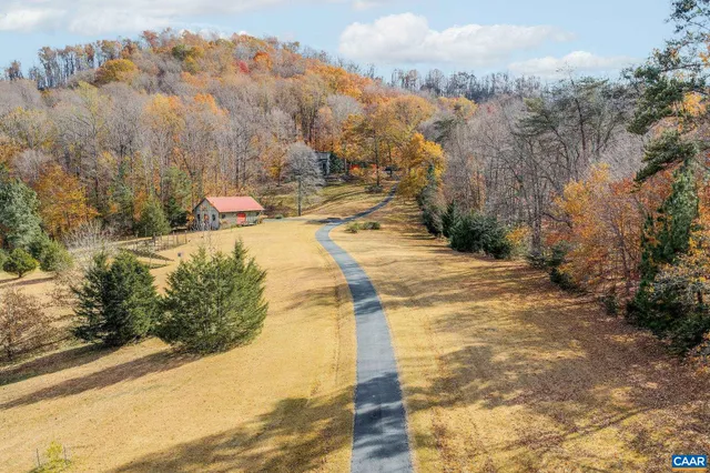 a front view of a house with yard