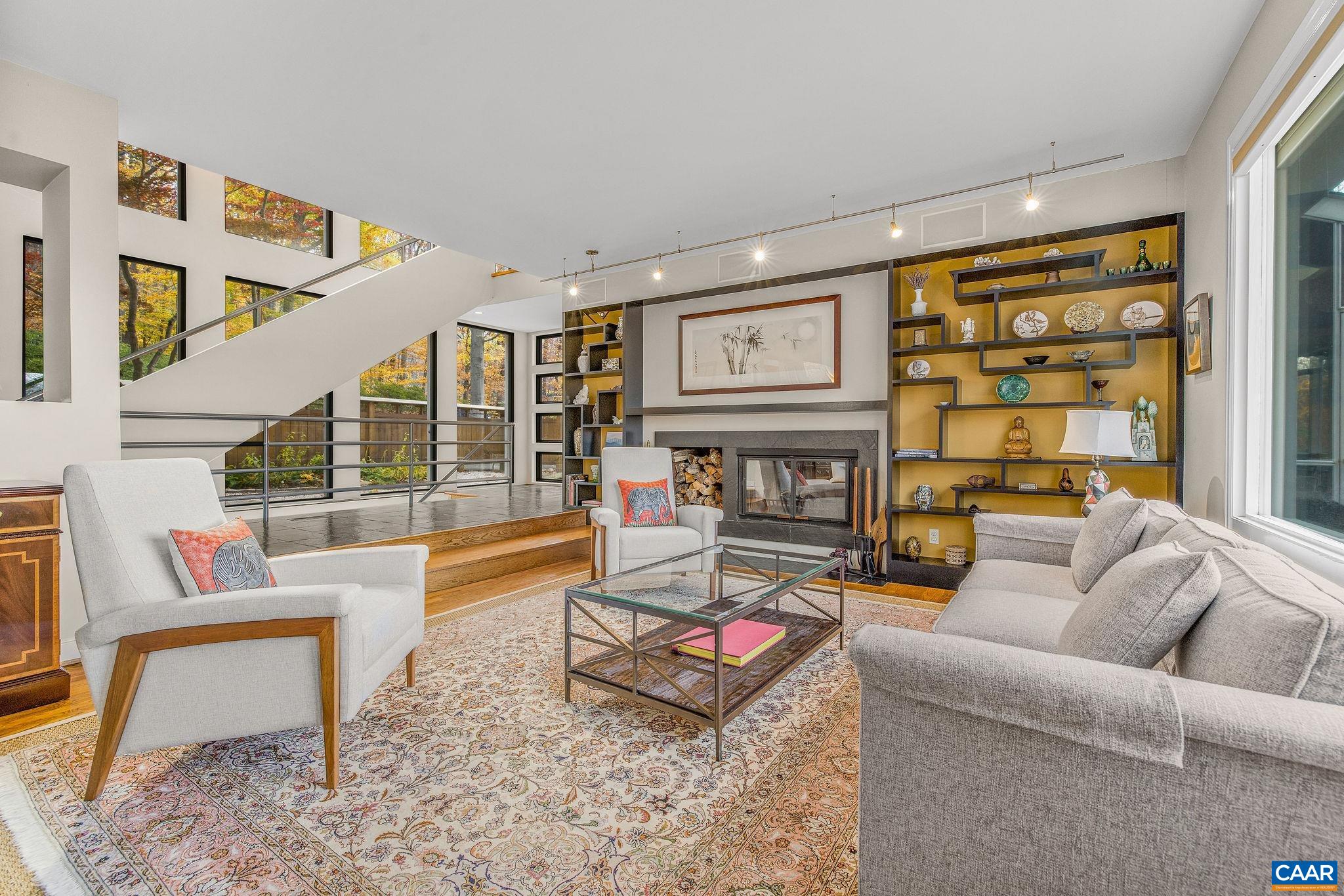 407 Broad Axe Road Charlottesville, VA 22903 - Photo 31 of 57 a living room with furniture and a floor to ceiling window
