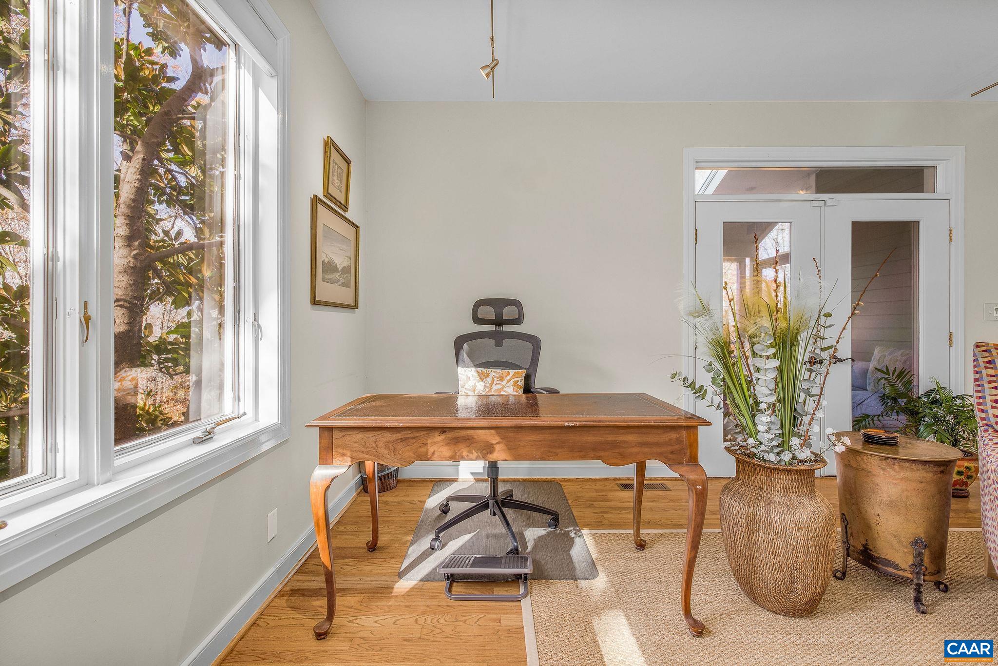 407 Broad Axe Road Charlottesville, VA 22903 - Photo 35 of 57 a view of a dining room with furniture window and outside view
