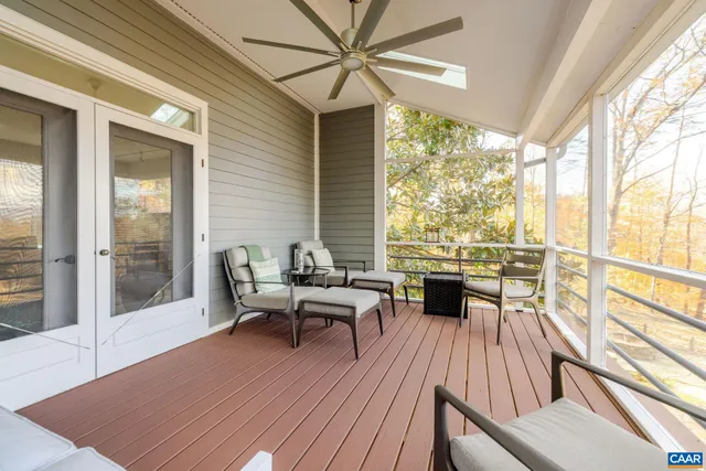 a bathroom with a bathtub sink and mirror