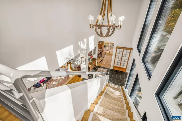 a bed room with a bed and a night stand