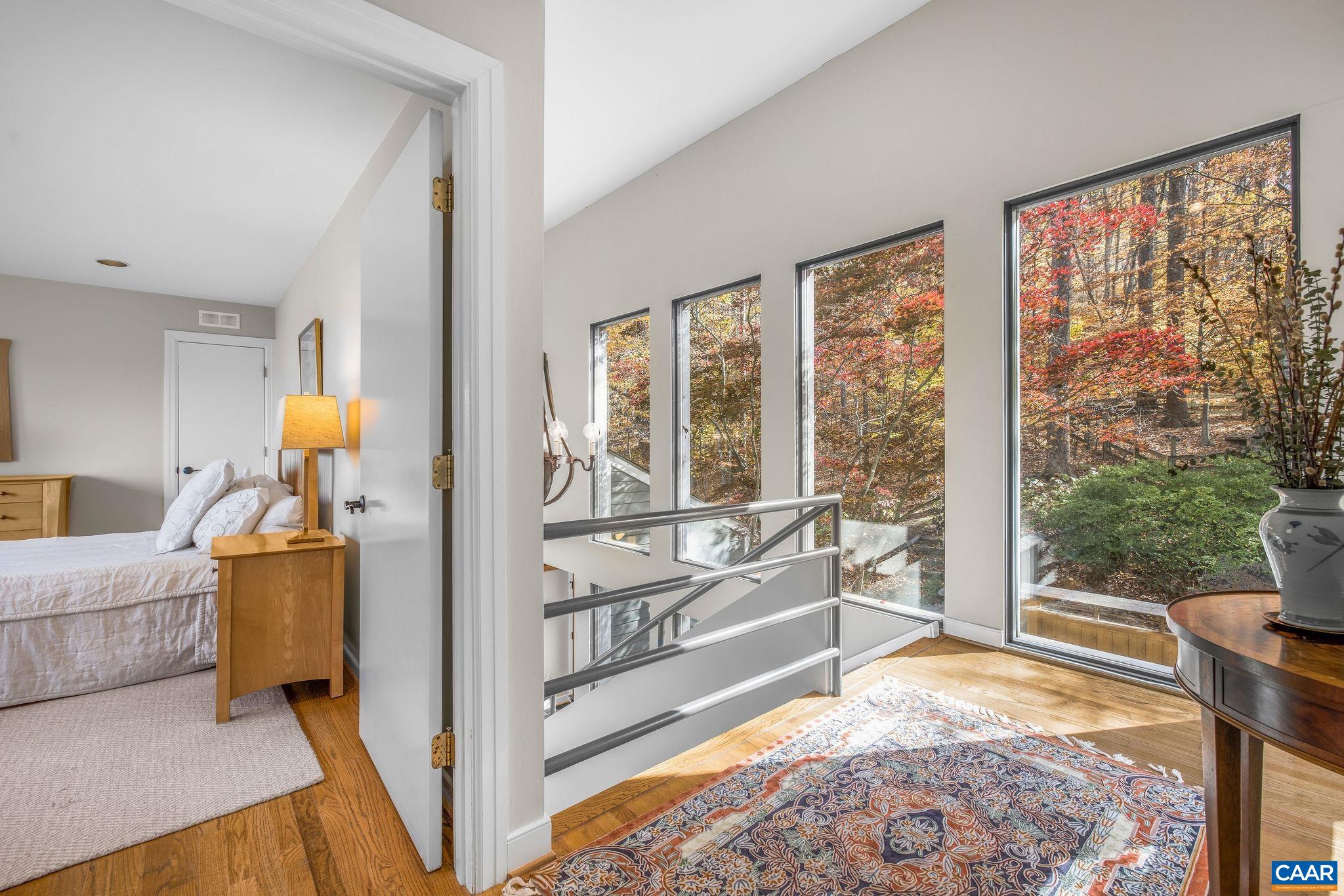 407 Broad Axe Road Charlottesville, VA 22903 - Photo 41 of 57 a view of living room with furniture and floor to ceiling window
