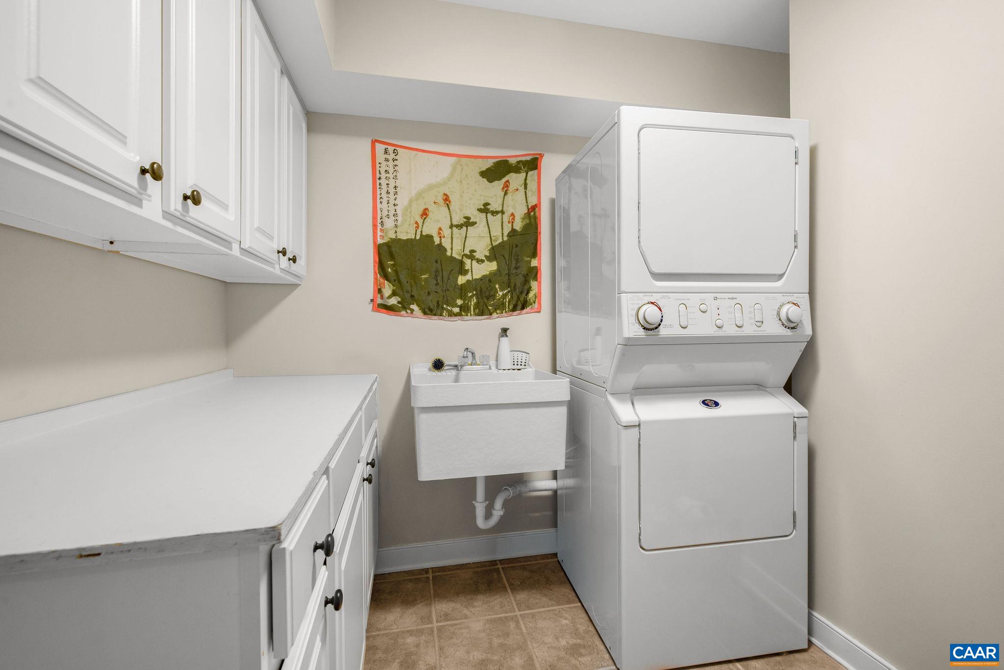 407 Broad Axe Road Charlottesville, VA 22903 - Photo 57 of 57 a utility room with dryer and washer