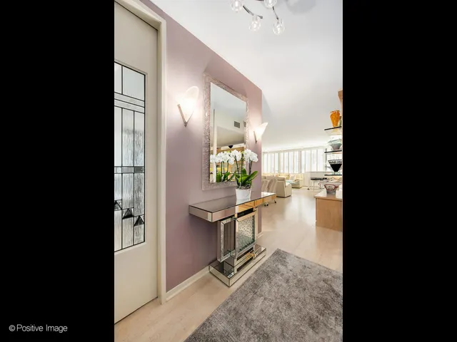 a view of living room filled with furniture and rug
