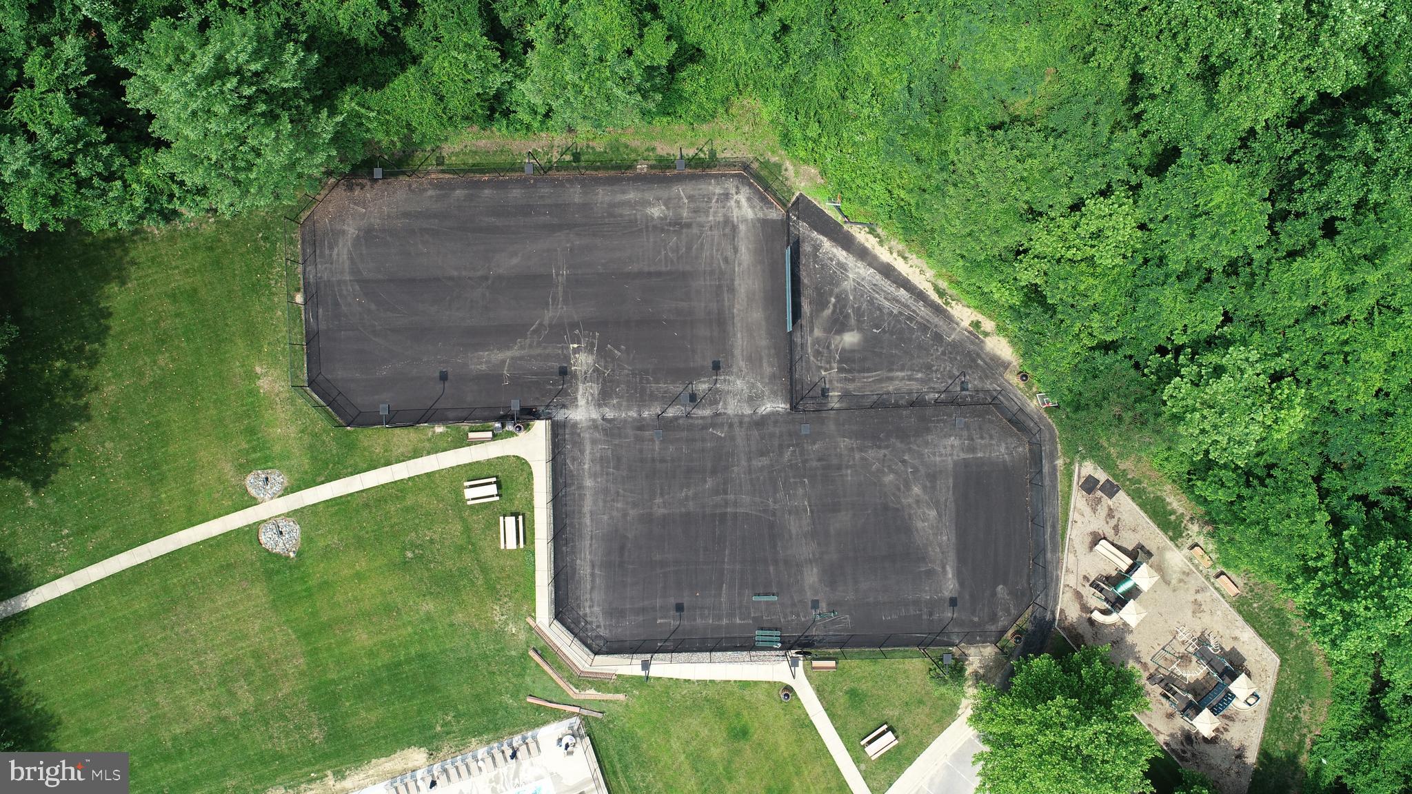 3571 Old Trail Road Edgewater, MD 21037 - Photo 49 of 58 Resurfacing of the tennis/basketball courts