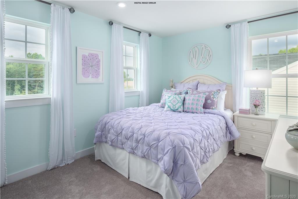 7120 Messina Road, Unit 135 Indian Land, SC 29707 - Photo 4 of 10 a bedroom with a bed and window