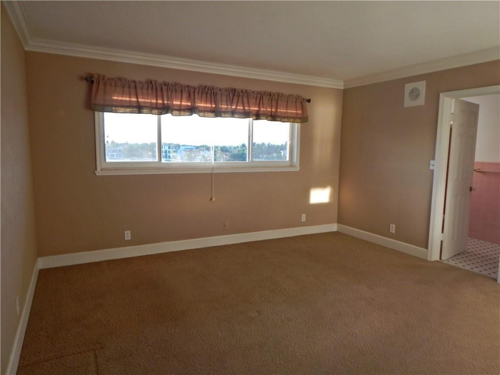 1201 South Riverside Drive, Unit PHB Pompano Beach, FL 33062 - Photo 17 of 33 a view of an empty room with a window