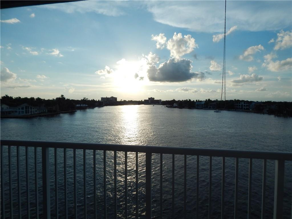 1201 South Riverside Drive, Unit PHB Pompano Beach, FL 33062 - Photo 2 of 33 a view of a lake from a balcony