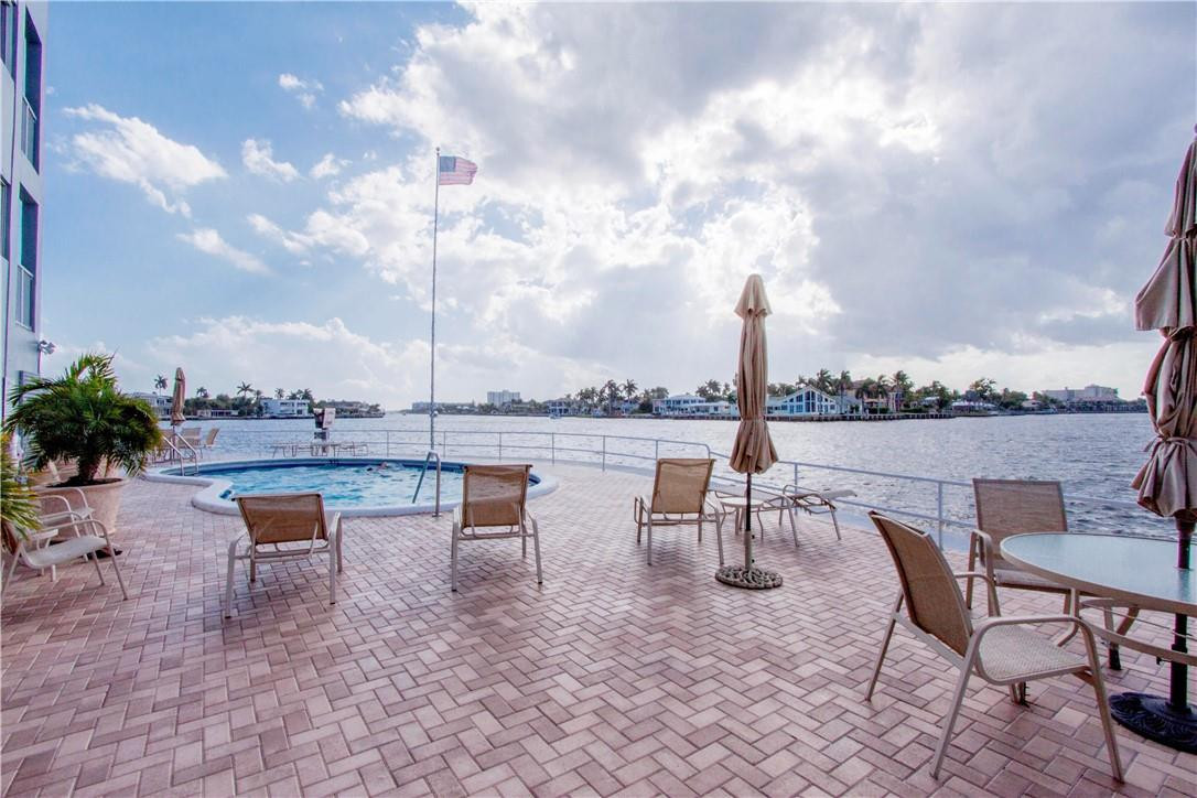 1201 South Riverside Drive, Unit PHB Pompano Beach, FL 33062 - Photo 27 of 33 an outdoor view having patio