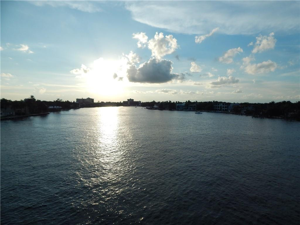 1201 South Riverside Drive, Unit PHB Pompano Beach, FL 33062 - Photo 3 of 33 a view of a water fountain and a floor to ceiling window