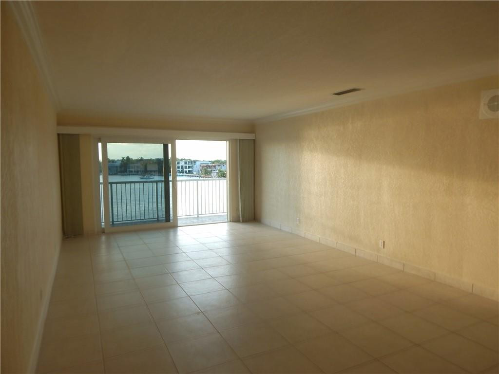 1201 South Riverside Drive, Unit PHB Pompano Beach, FL 33062 - Photo 8 of 33 a view of empty room with floor to ceiling window