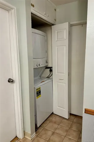 a utility room with cabinets