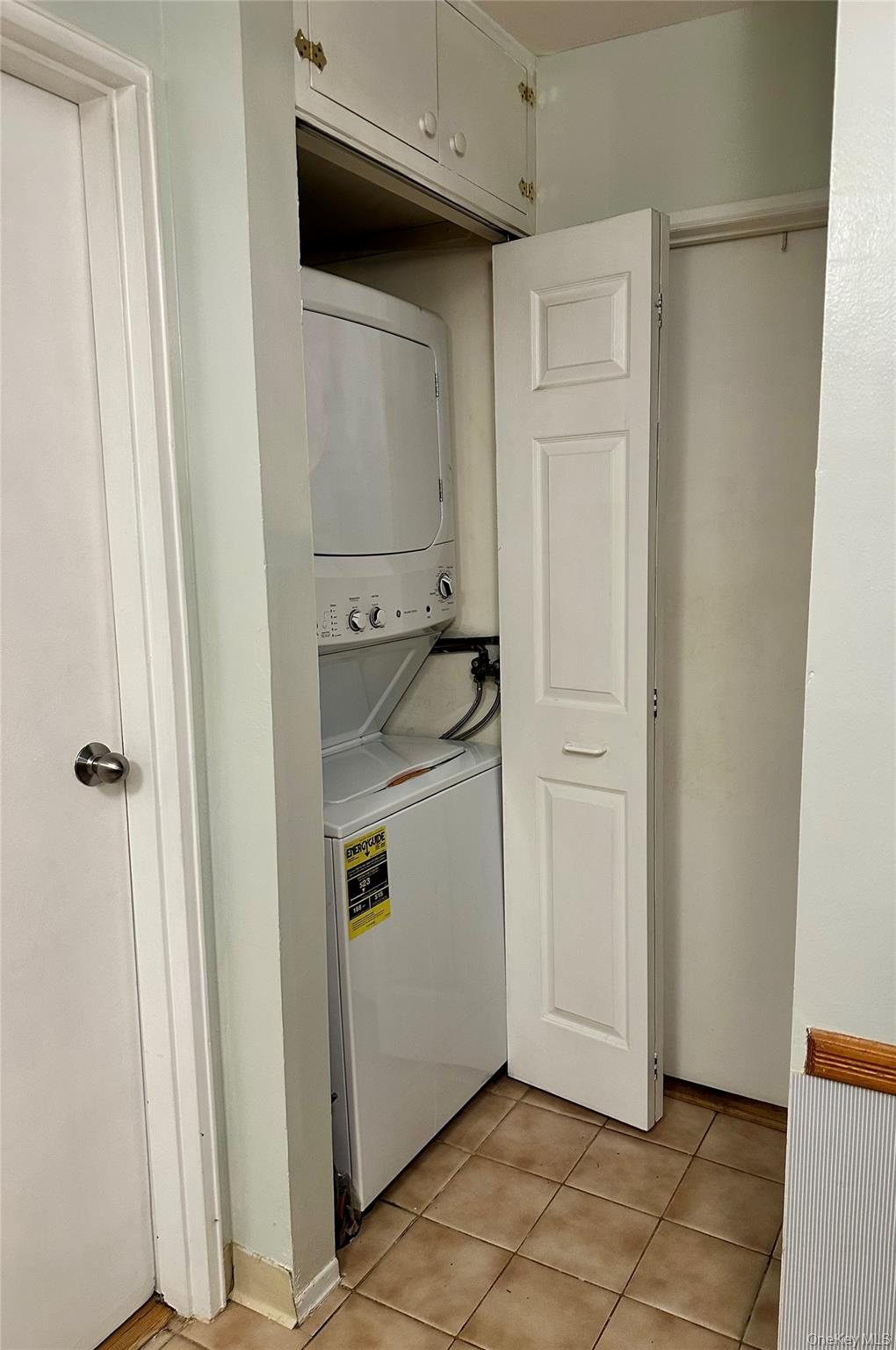 124 Santa Barbara Drive Plainview, NY 11803 - Photo 22 of 24 a utility room with cabinets