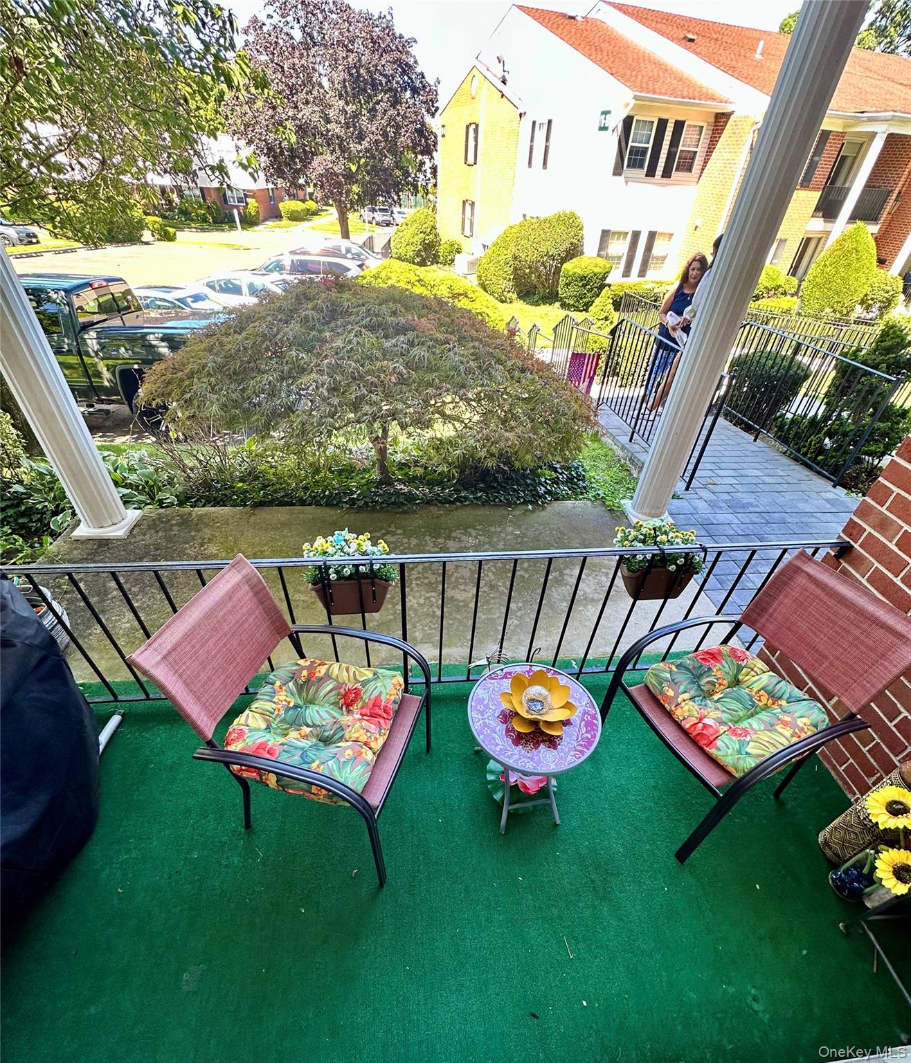 124 Santa Barbara Drive Plainview, NY 11803 - Photo 8 of 24 a backyard of a house with table and chairs