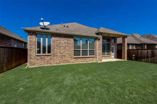 a view of a house with a garden