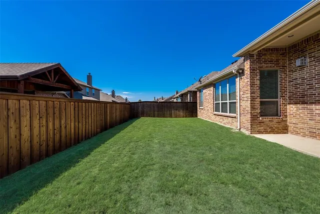a view of a house with garden