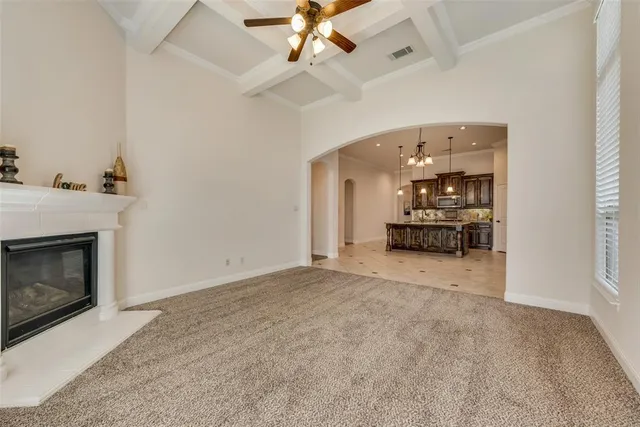 a view of a livingroom with furniture and a fireplace