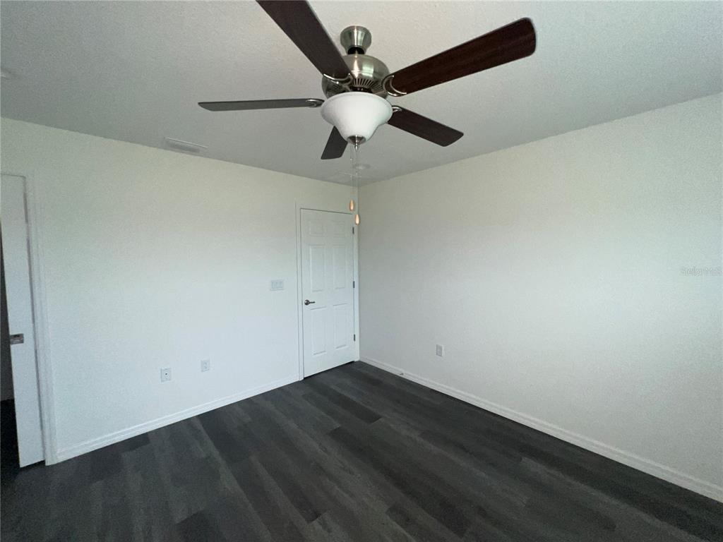 9 Maple Lane Ocklawaha, FL 32179 - Photo 20 of 26 wooden floor in an empty room