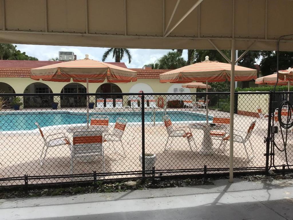 5641 Southwest 2nd Court, Unit 212 Margate, FL 33068 - Photo 17 of 18 a view of outdoor space yard and patio