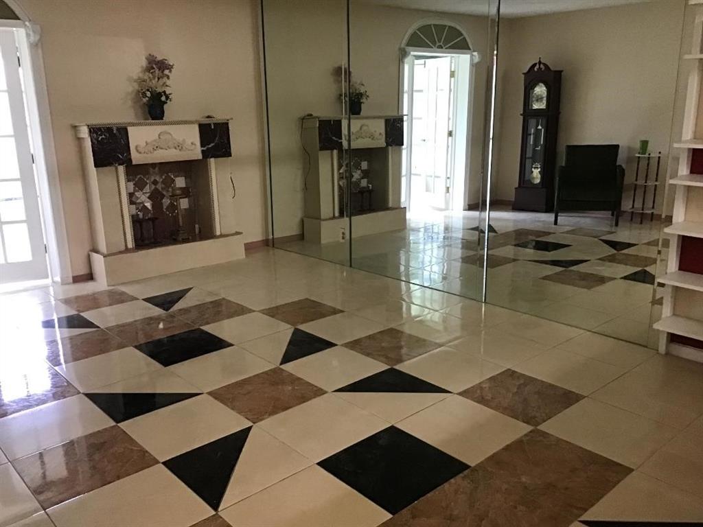 5641 Southwest 2nd Court, Unit 212 Margate, FL 33068 - Photo 3 of 18 a bathroom with a black white checkered floor