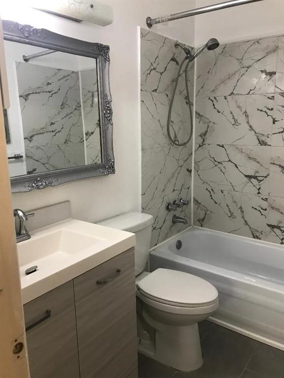 5641 Southwest 2nd Court, Unit 212 Margate, FL 33068 - Photo 5 of 18 a bathroom with a toilet sink and shower