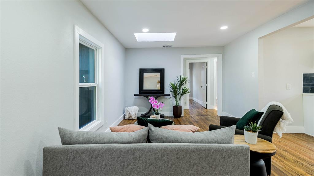 10523 Newcombe Drive Dallas, TX 75228 - Photo 5 of 25 a living room with furniture and a potted plant