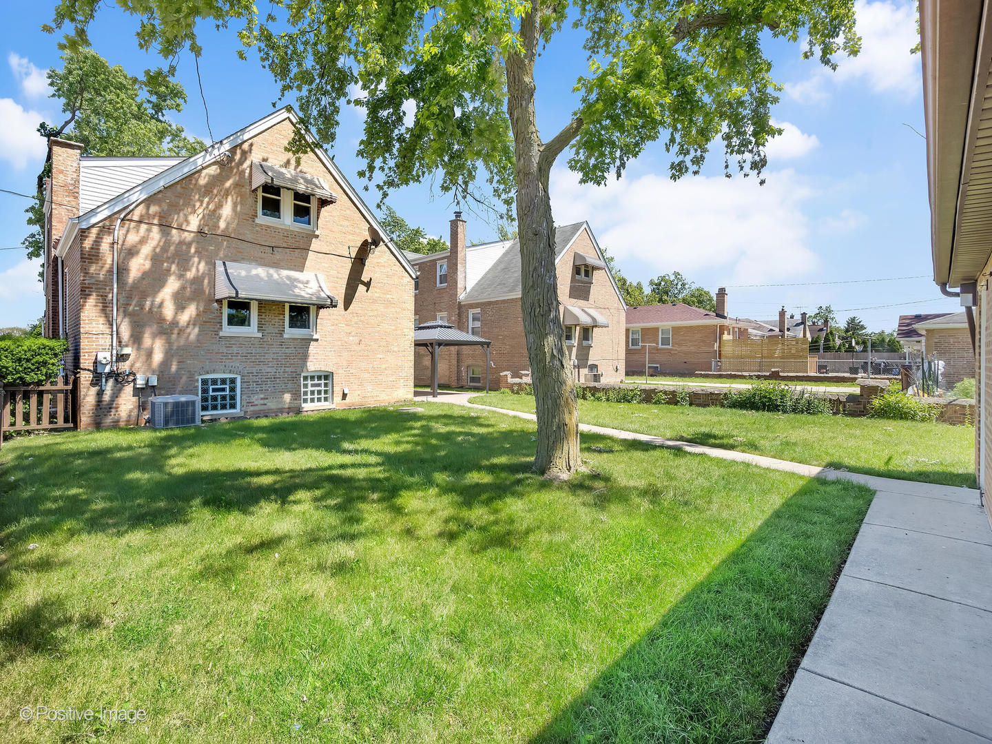 2216 14th Avenue North Riverside, IL 60546 - Photo 23 of 24 a front view of house with yard and green space