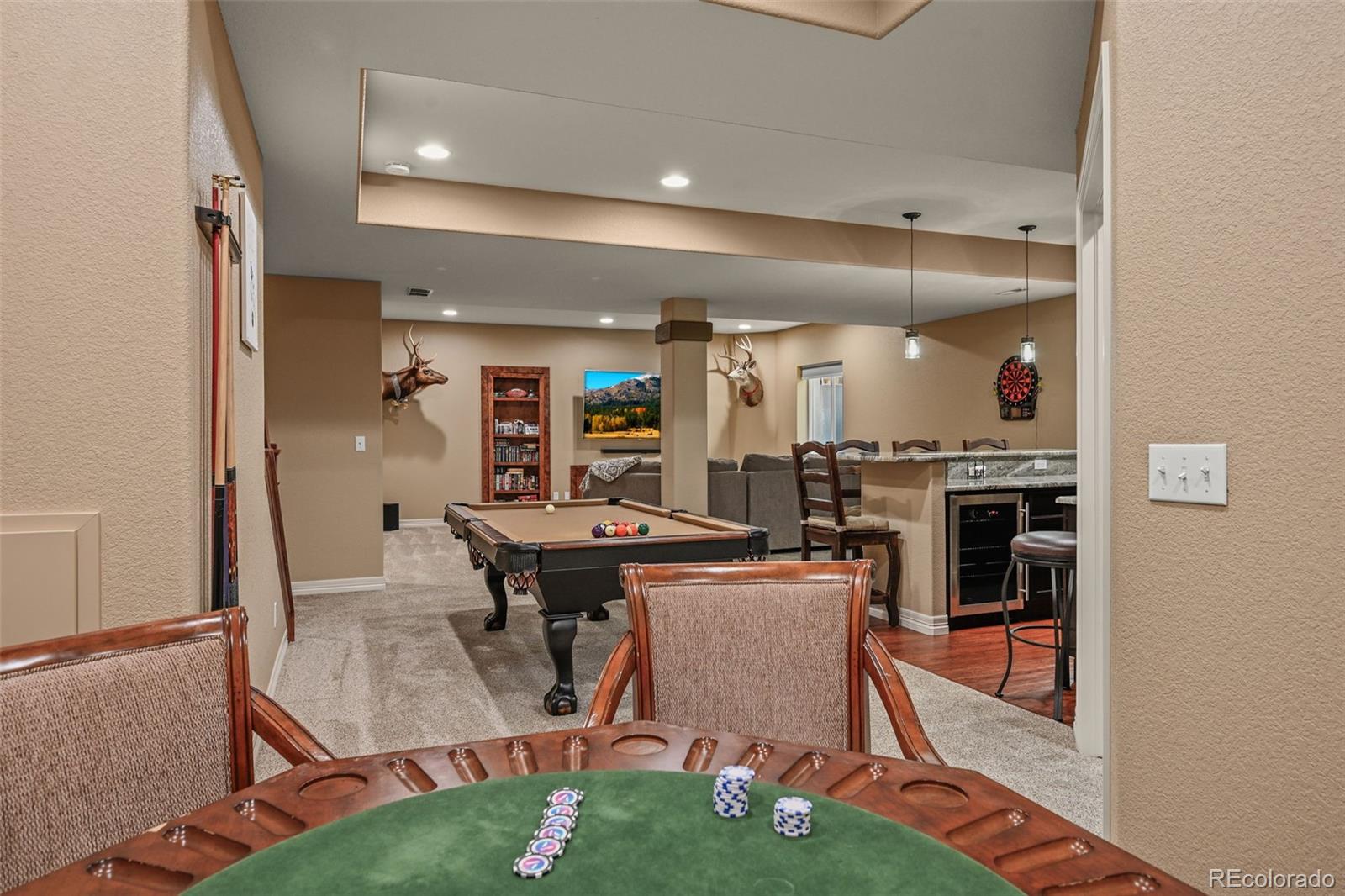 10123 Mockingbird Lane Highlands Ranch, CO 80129 - Photo 10 of 43 a dining room with a table and chairs