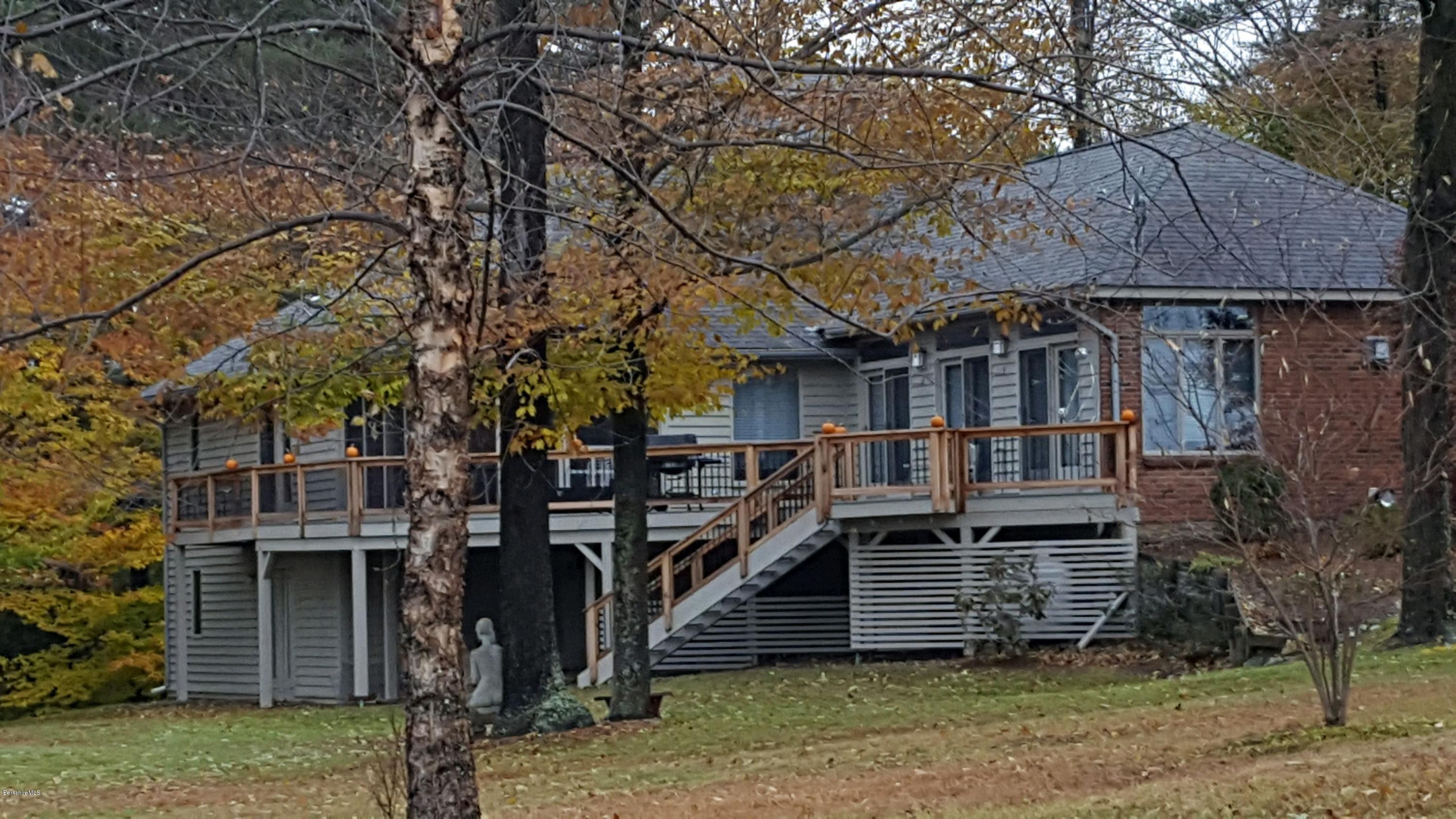 98 Ridge Road Worthington, MA 01098 - Photo 1 of 16 a view of a house with a yard