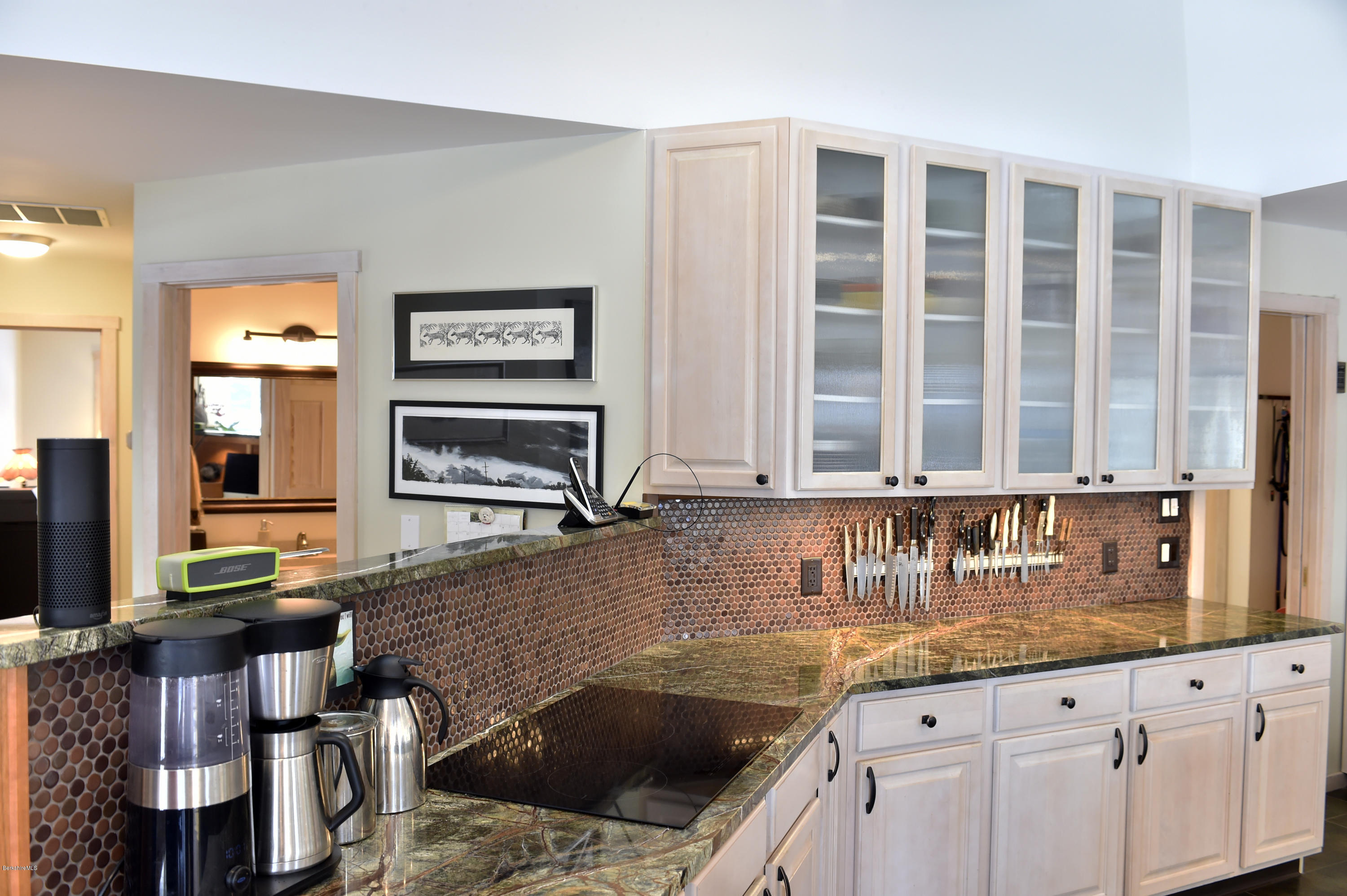 98 Ridge Road Worthington, MA 01098 - Photo 5 of 16 a kitchen with granite countertop a stove a sink and a refrigerator