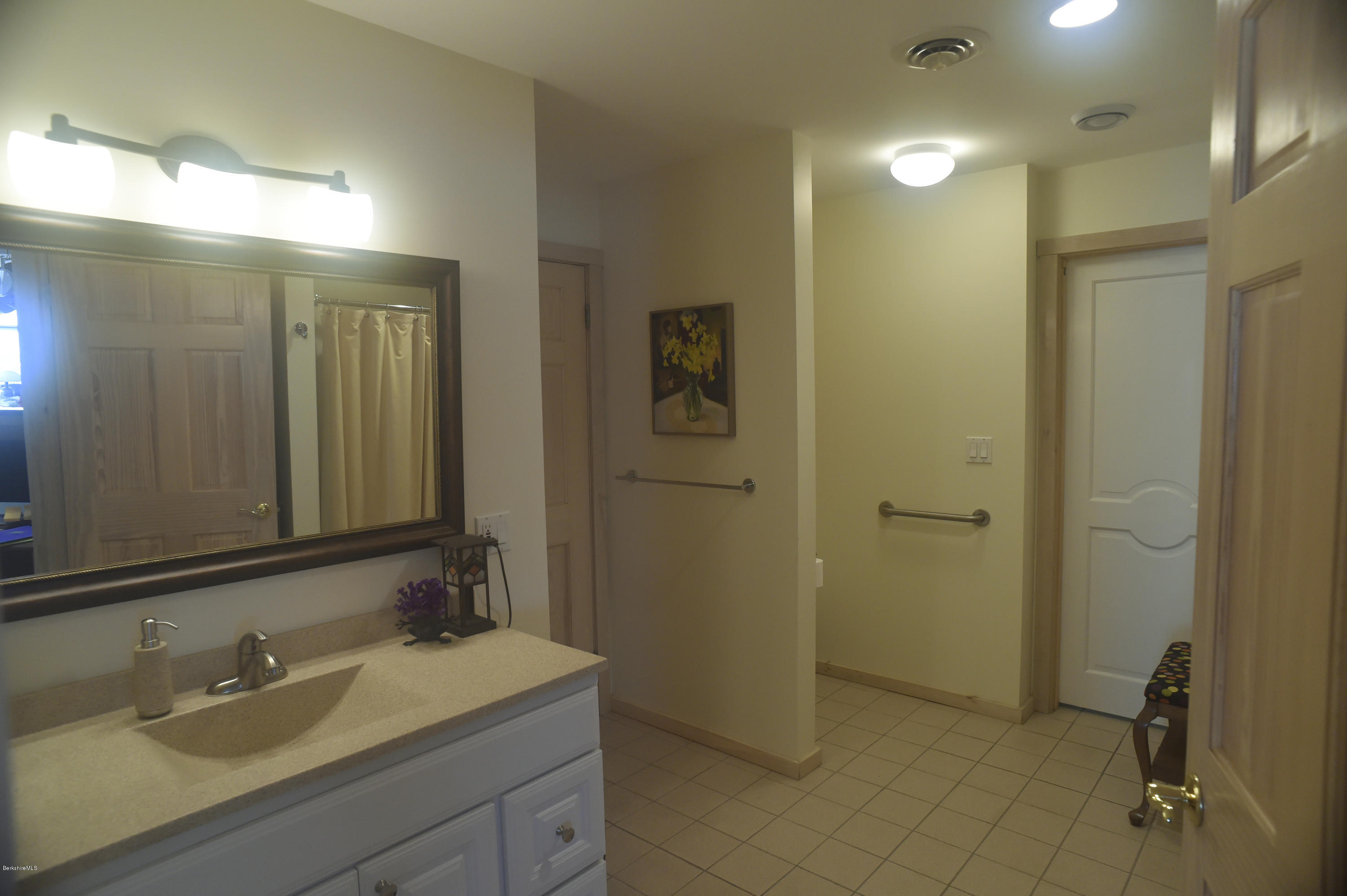 98 Ridge Road Worthington, MA 01098 - Photo 10 of 16 a bathroom with a sink and mirror