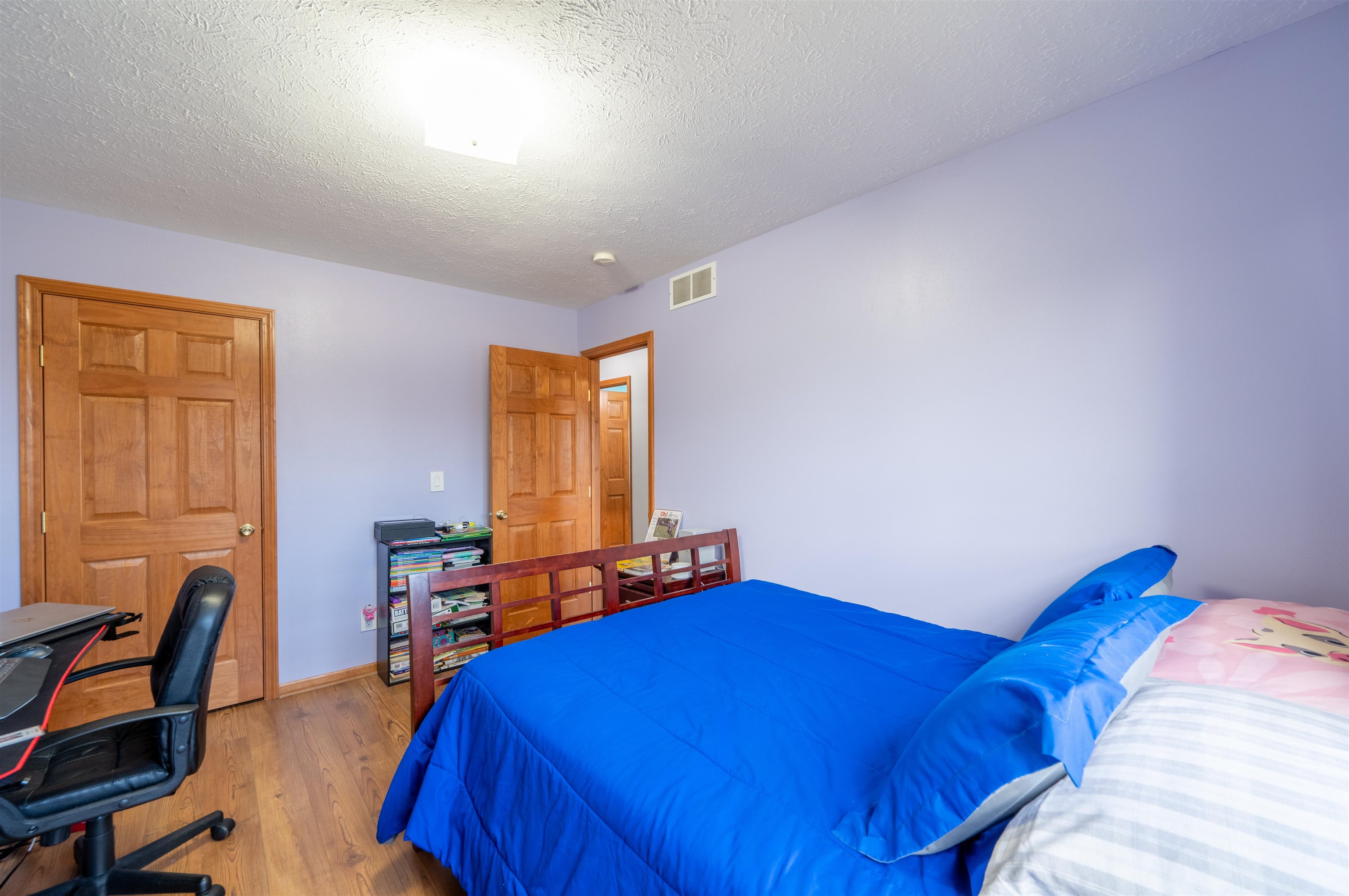 726 Golden Prairie Drive Davis Junction, IL 61020 - Photo 17 of 29 a bed room with a bed and a chair